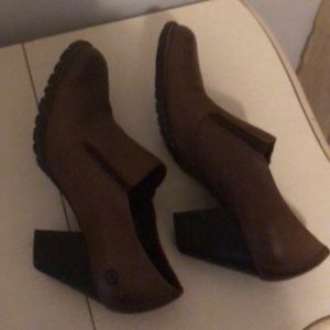 Had these awhile but never really worn them much. Few heel scratches. Comfy!